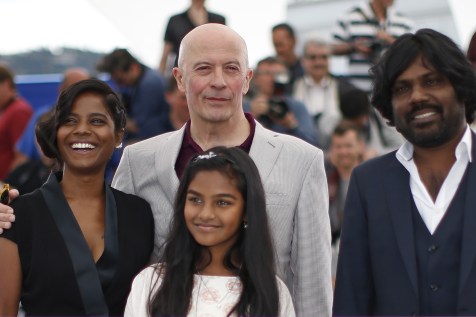 (L-R) Cast member Kalieaswari Srinivasan, Director Jacques Audiard, cast members Claudine Vinasithamby and Jesuthasan Antonythasan pose during a photocall for the film "Dheepan" in competition at the 68th Cannes Film Festival in Cannes, southern France, May 21, 2015.        REUTERS/Eric Gaillard - RTX1DWU3
